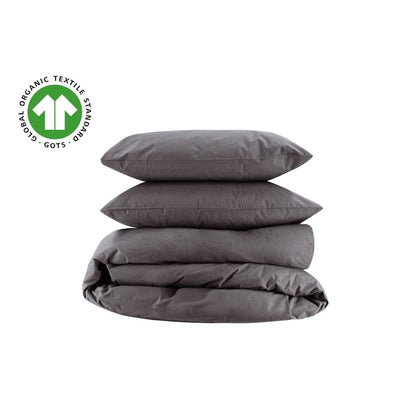 Gray Essential 100% Organic Cotton Percale bedding set with pillows and duvet on a white background, featuring the Global Organic Textiles Standard (GOTS) logo.