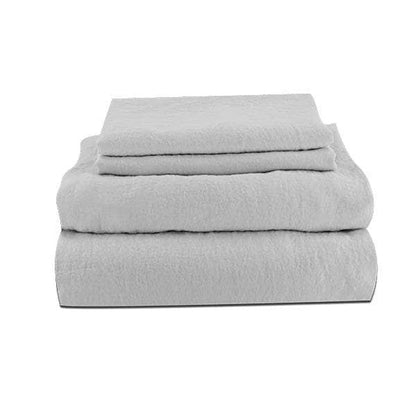 Stack of gray textured linen bed sheets on a white background