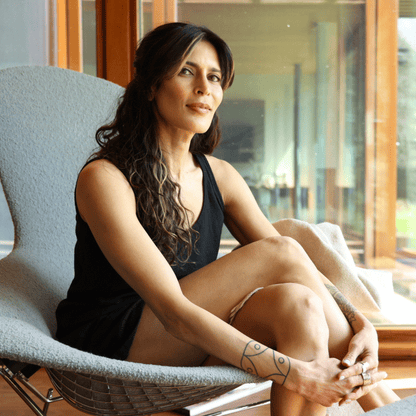 Woman wearing Vanessa Cooling Pajamas designed for night sweats and hot flashes