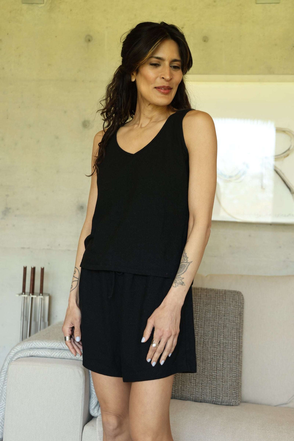 a model wearing Women's moisture-wicking PJs for night sweats size small/medium, black