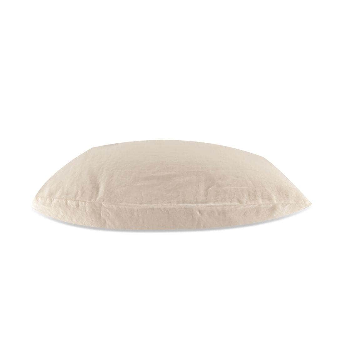 Beige cushion on a white background