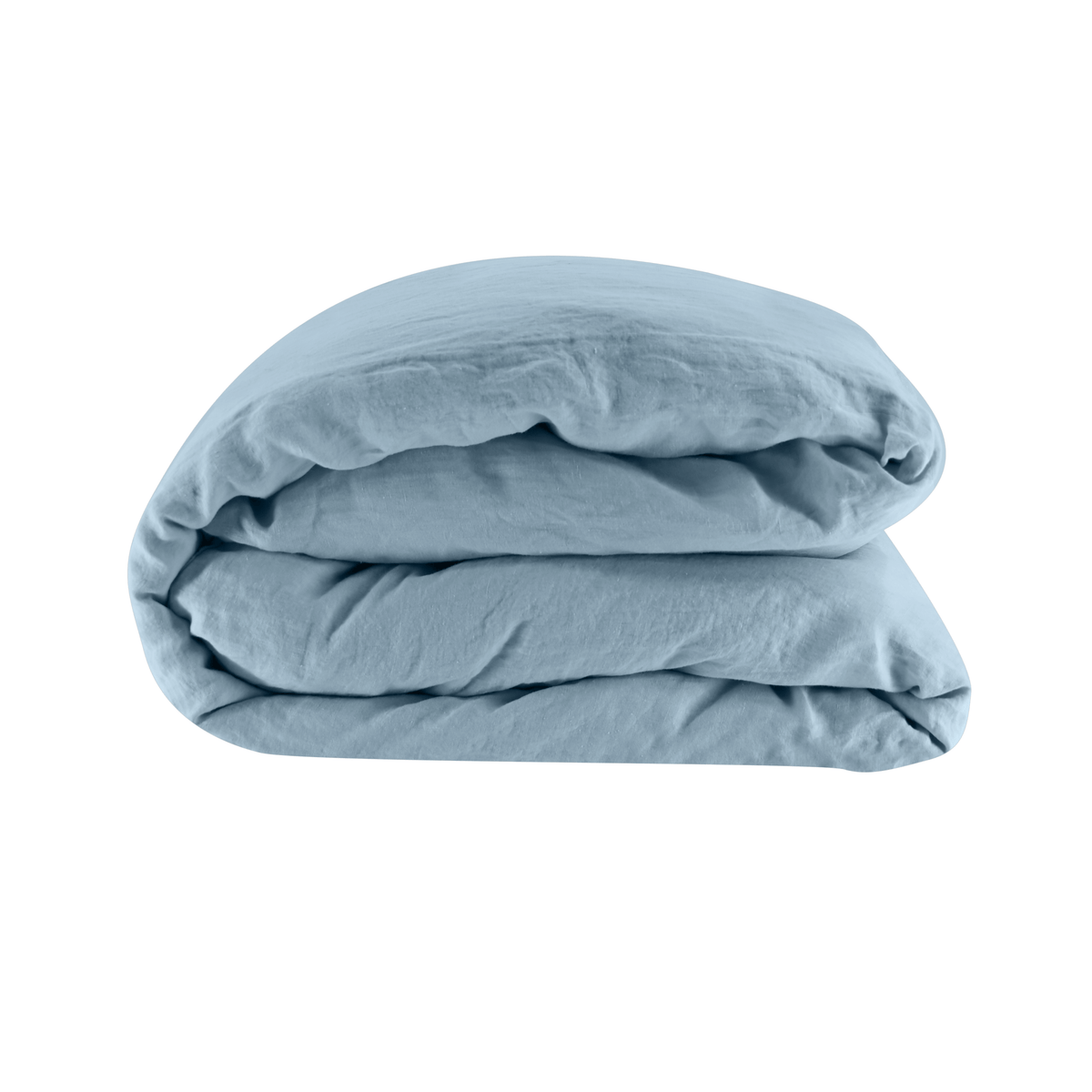 Folded light blue comforter on a white background